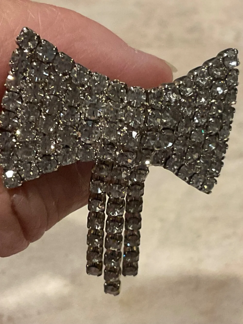 Vintage Rhinestone Bow Brooch Silvertone setting 1.5”